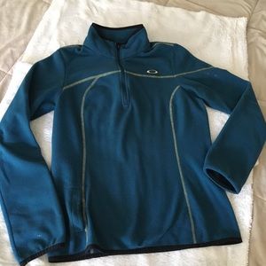 Used Oakley fleece pullover with partial zip front